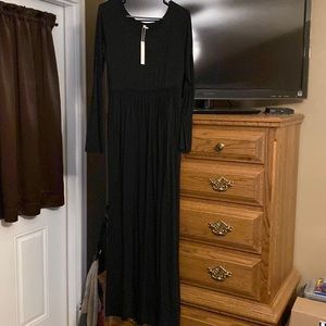 Long Sleeve brand new maxi dress with side pockets.